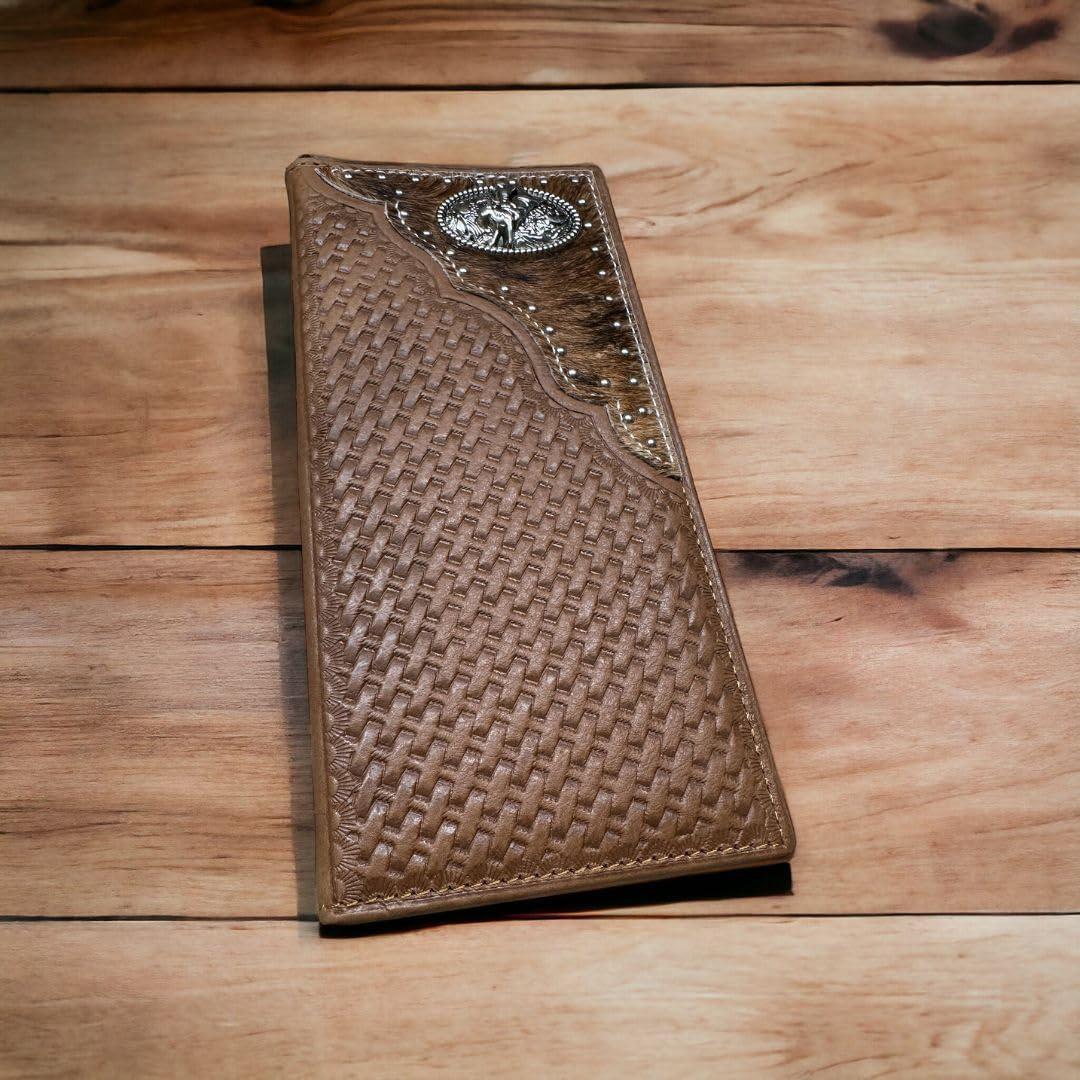 A brown leather Bull Rider Long Wallet W Cowhair Basketweave by Western Stakes featuring a textured, basket-weave design sits on a wooden surface. The wallet has an ornamental embellishment with a silver rodeo concho on one upper corner, adding a touch of elegance to its rustic appearance.