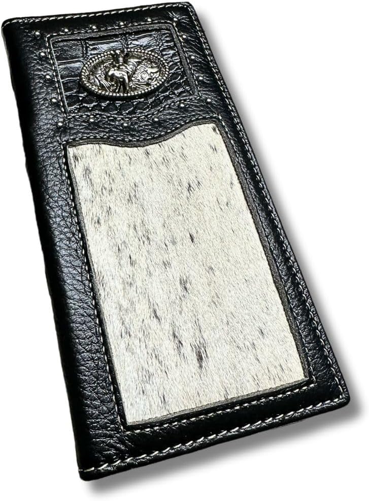 A Western Stakes Rodeo Long Wallet Black With Cowhair & Bull Rider Concho. This cowboy wallet includes a decorative metal emblem near the top, featuring an intricate design. The leather has a textured finish with visible stitching along the borders.