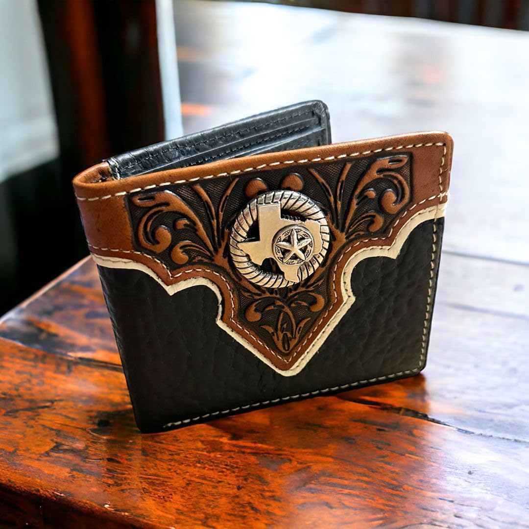 A black and brown Western Stakes Mens Leather Wallet Texas Star Concho Black with ornate Western flair is displayed on a wooden surface. The wallet features an embossed design with a Texas Star Concho in the center, encircled by an emblem in the shape of Texas.