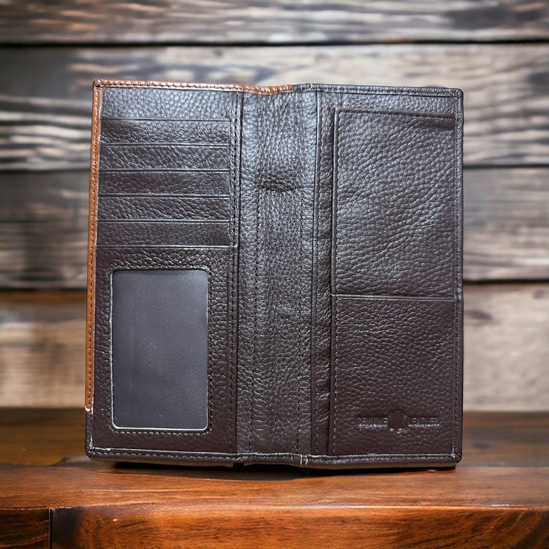 A premium **Mens Long Wallet Coffee Longhorn Concho** by **Western Stakes** lies open on a wooden surface, showcasing multiple card slots, a transparent ID slot, and various bill pockets. The background features a textured wooden pattern that adds to its western charm.