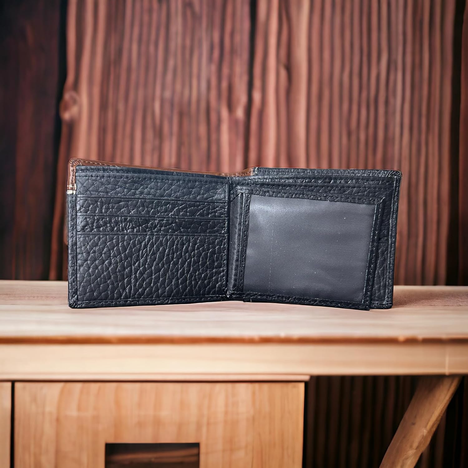 An open Mens Leather Wallet Horse & Horseshoe Soft Black Leather Bi Fold by Western Stakes with multiple card slots and a transparent ID window is displayed on a light wooden surface with a dark wooden background. This western cowboy wallet features an engraved horse design, adding a touch of rugged charm.