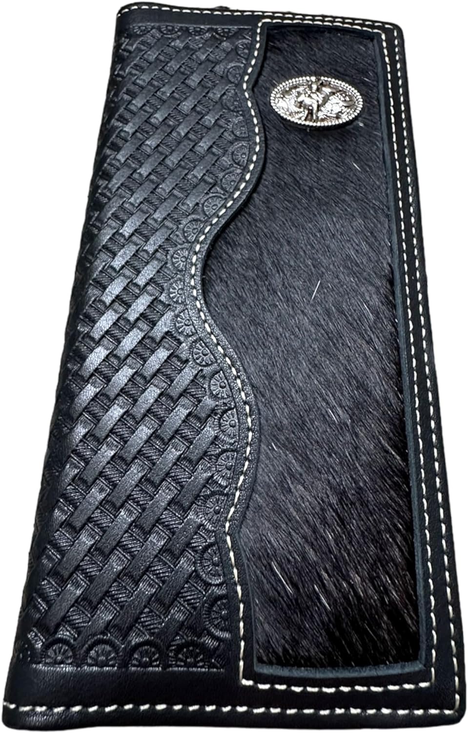 A Western Stakes Bull Rider Long Wallet W Cowhair Basketweave with intricate woven and tooled patterns, perfect as a cowboy accessory. The wallet features a textured, hair-on-hide panel and a decorative silver emblem on the upper right corner. White stitching outlines the edges, creating a stylish finish worthy of any bull rider.