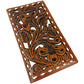 A rectangular, handcrafted Urbalabs Nutrition Western Cowboy Leather Long Wallets for Men Checkbook Tooled Wallet Floral Bifold made from genuine leather with an intricate floral design. The brown leather is decorated with detailed, swirling patterns of leaves and flowers, has white stitching along the edges, and offers RFID blocking for added security.